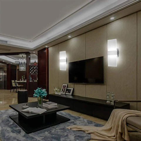 Modern LED Wall Sconce 12W Cool White 6000K Up Down Light illuminating a living room with TV and decor, aluminum and acrylic finish