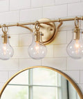 Brushed Gold Vanity Light Fixture With Three Clear Glass Globes Over Mirror, Damp Rated Bathroom Bar Light, 20 Inch Long