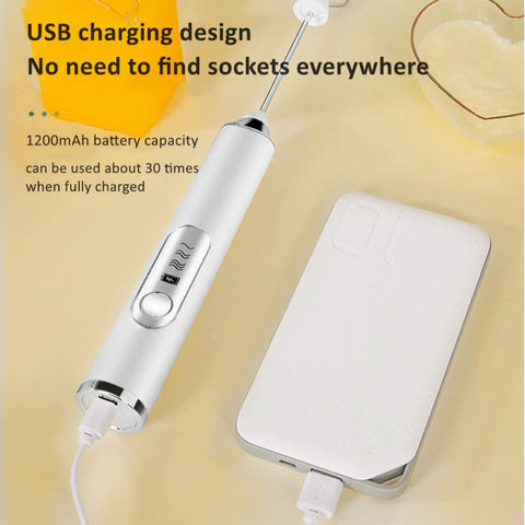 Rechargeable Milk Frother With Three Speed Electric Handheld Coffee Mixer connected to a USB power bank on a yellow surface