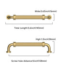 Diagram of champagne bronze cabinet handle showing dimensions including width 0.63in, total length 5.6in, height 1.3in, screw spacing 5in.
