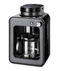 Compact Full Automatic Bean To Cup Coffee Machine with stainless steel blades and glass carafe for easy brewing.