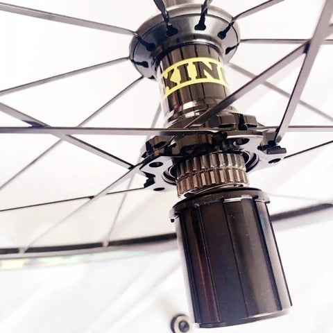 Close-up of the DT Tooth 36T hub of the Carbon Fiber 700C Road Bike Wheel Set With 50mm Clincher Rim Ultralight Aluminum Alloy Double Wall