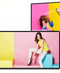 85 Inch Indoor Wall Mount LCD Digital Signage Panel 4K Resolution displaying vibrant fashion photoshoot on colorful backgrounds.