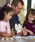 Battery Powered Binocular Stereo Dissecting Microscope With 20X Magnification, LED Illumination, And Interchangeable 5X And 10X Eyepieces, Great For Home Science, Classroom Projects, Rocks, Stamps, Jewelry, And Large Specimens on table with children