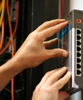 Person installing a device on a wall near various cables, using Slot Marking Tool Set For Keyhole Slots And Hangers Without Measuring Or Templates No Guesswork Needed Recessed Marker Keeps Surfaces Clean While You Align Hangers Sawtooth Hooks And Keyhole Slots With Ease