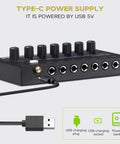 Six Channel Portable Mini Audio Mixer With 6.35mm To 3.5mm Adapters Stereo Mono Switch And 5V DC Power for various inputs.