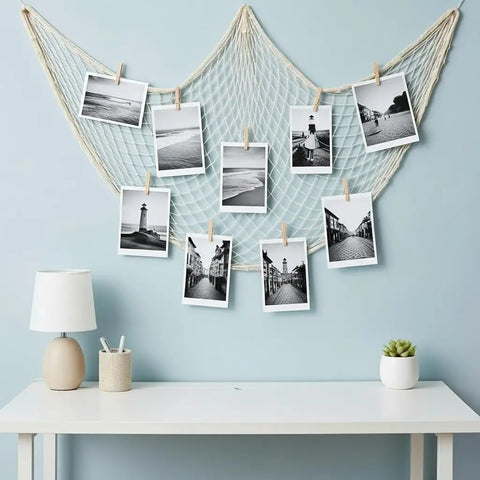 Ocean Party Net Decorations 2 Pack 39.37 by 78.74 Inch Fishing Net Backdrop Wall Hanging showing photo display on light blue wall