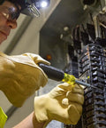 Electrician using Multi Bit Screwdriver And Nut Driver 6 In 1 Set With Extended Reach on electrical panel