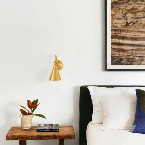 Lupe Wall Sconce Brass With Perforated Shade And Bowtie Swivel Dope Industrial Chic Meeting Midcentury Modern And Traditional Vibes