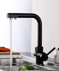 Black Kitchen Faucet with 360° SwivelDual Handle Water Filter TapDeck-Mounted Mixer with Aerator3-Way Design for Clean Drinking WaterAusious Clouds LWX in a sink with water flowing.
