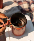 Insulated French Press Keeps Your Daily Joe Hella Hot For Hours With Tough Stainless Steel Build And Secure Twist Lid Crafted For Cabin Weeks And Backyard Chillin 32 Fl Oz Red Rock, showing brewing process.