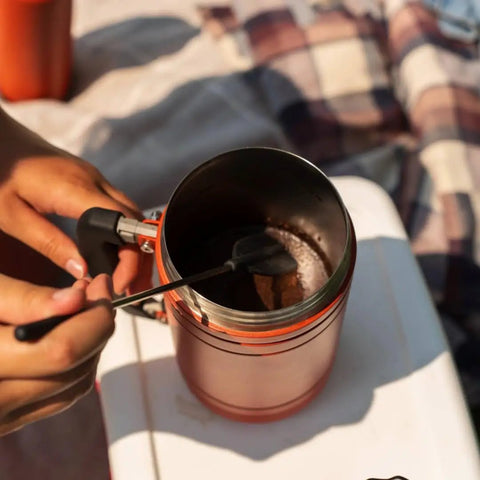 Insulated French Press Keeps Your Daily Joe Hella Hot For Hours With Tough Stainless Steel Build And Secure Twist Lid Crafted For Cabin Weeks And Backyard Chillin 32 Fl Oz Red Rock, showing brewing process.