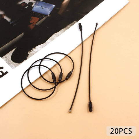 20 Pcs Black Stainless Steel Wire Keychains 1.5mm Thick Elastic Wire Rope Loops 5.9 Inches Long on a beige surface