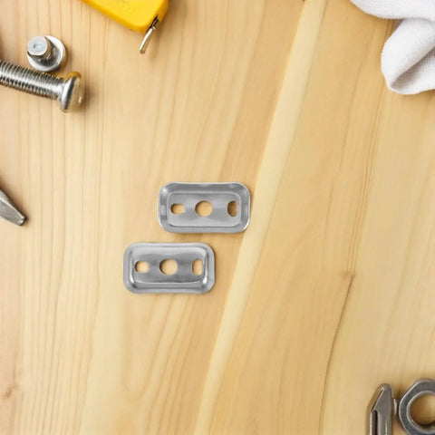 Stainless Steel Towel Bar Mounting Hardware Set With 45x26mm Backing Plates, screws, and tools on wooden surface
