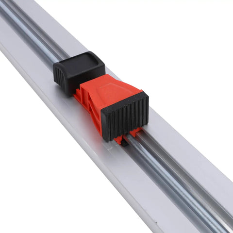 Heavy Duty Aluminum Straight Edge Guide For Circular Saws Featuring A Rock Solid Rubber Clamp and Non Slip Rail close-up of clamp and track.