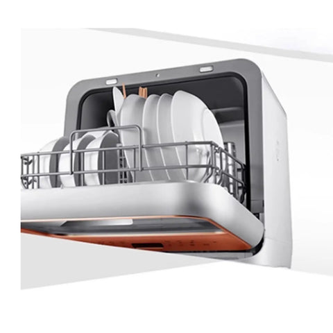 Hassle Free Plug And Play Slick Countertop Dishwasher Fully Automatic Mini Desktop Cleaner with dishes inside.