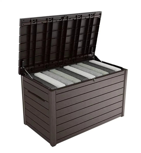 Open XXL 230 Gallon Outdoor Deck Storage Box With Weather Resistant Resin And Lockable Piston Lid showing towel storage.