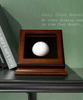Hole In One Golf Ball Display Case With Wood Frame And Glass Lid Handcrafted Keepsake Box on tabletop