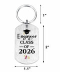 Engineer Graduation Gift Dog Tag Keychain For Class Of 2026 with gear and tool engraving, size 2 x 1.1 inches.