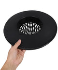 Hand holding a black Durable Hydroponic Mesh Net Pot Bucket With High Drainage for Healthy Roots and Easy Garden Setup.