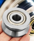 Top Shelf Heavy Duty V Groove Guide Pulley Bearings With Sealed Steel Rail Wheels Precision Ground double row design in hand.