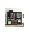 Freestanding Wooden Closet System Featuring Modular Cubbies And Hanging Rods Delivers Totally No Sweat Customizable Wardrobe Storage For Clothes Shoes And Accessories In Sleek Gray with coats and storage boxes.