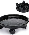 Black resin plant caddy with four wheels, part of Three Pack Rolling Plant Caddies With Wheels For Round Planters 13 Inch Diameter 3.5 Inch High.