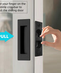 Heavy Duty Pocket Door Handles With Slick Edge Pull Upgrade Your Homestead Setup With Zero Sweat Install Using 304 Stainless Steel Build For Sleek Black Finish And Reliable Operations, showing installation with finger on handle.