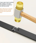 Rubber hammer tapping 52 Inch Bifold Barn Door Hardware rail during installation