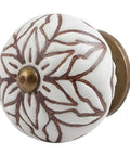 Close-up of 100 Pack Floral Brown Ceramic Drawer Knobs For Kitchen Cabinets And Dressers With No Sweat Assembly And Rock Solid Everyday Durability For Your Home Glow Up.