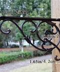 Hella Sturdy Rock Solid Cast Iron Wall Mounted Corner Support Brackets With A Killer Vintage Floral Design for corner shelving, 32.7cm.