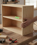 Bubble Level Vial, Acrylic Measuring seen on a wooden shelf with a hand adjusting and measuring tools scattered.
