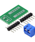 5Pcs 2x6 Terminal Block Distribution Module With 2P Screw Terminal To 2.54mm Pitch Dupont Pin Header Connector For PCB Projects FR 4 15x30mm 1.6mm Thick Durable And Breadboard Ready For Electronics Prototyping, showing green PCB with black pin headers and blue terminal block.