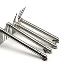 Four stainless steel garden hoe and pickaxe double use tools with a non-slip handle for planting and weeding in yards and beds.