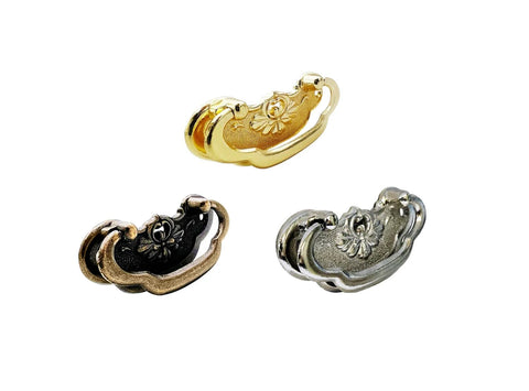 Three vintage bail drawer pull handles in zinc die cast with black, gold, and silver finishes, showcasing different design options.