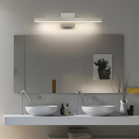 Modern Slick LED Vanity Light Fixture for Bathroom Mirror, Brushed Nickel, 23.62 Inch, 18W, mounted above double sinks.