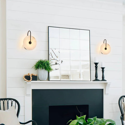 ELYCCUPA 10” Marble Wall Sconces Set of Two Matte Black Classic Stone Alabaster Wall Lights for Bedside Vanity Hallway, UL Listed, displayed beside a mirror.