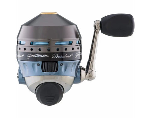 President Spincast Reel Size 10 With Dual Handle Positions Aluminum Spool And Dial Drag System Blue side view