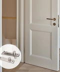 Stainless Steel Concealed Door Hinge With Thickened Pivot For 360 Degree Rotation Heavy Duty Rustproof Hinge on a wood frame door
