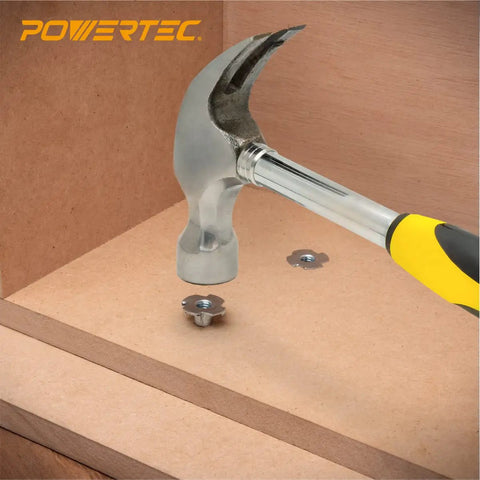 Hammer striking Heavy Duty Zinc Plated Tee Nuts 1/4 20 Thread 50 Pack For Woodworking Furniture Builds in wood.