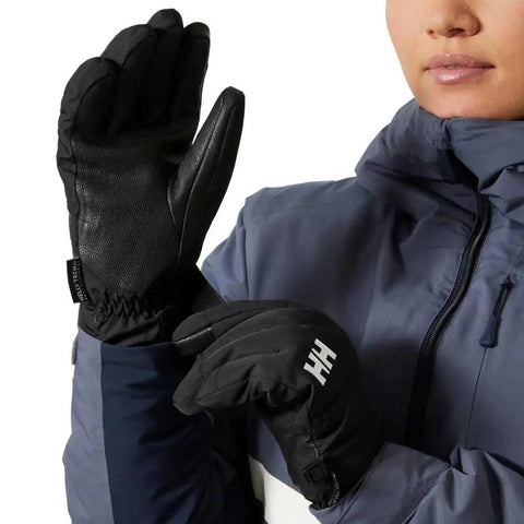 Woman wearing Women's Swift HT Glove For Extreme Weather, Waterproof And Breathable With Fully Sealed Seams, Helly Tech Professional
