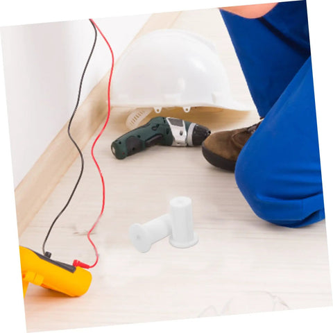 Stylish Silicone Wall Cable Plugs For Decor Hiding Messy Cords And A/C Sleeves Easy Install Kit Without Tools To Blend Seamlessly With Interior Walls In American Style Homes Today. White silicone wall cable plugs with cords and drill on floor
