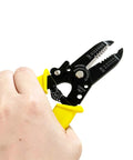 Hand holding 6.5 inch All Purpose Wire Stripper And Cutter Multi Function Hand Tool for 20 to 30 AWG solid and stranded wire