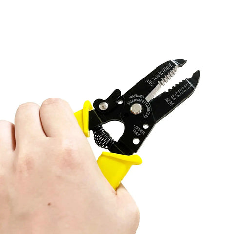 Hand holding 6.5 inch All Purpose Wire Stripper And Cutter Multi Function Hand Tool for 20 to 30 AWG solid and stranded wire