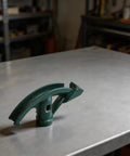 Heavy Duty Manual Pipe Bender For Copper And Aluminum Tubes Carbon Steel on metal workbench, showcasing high hardness steel construction.