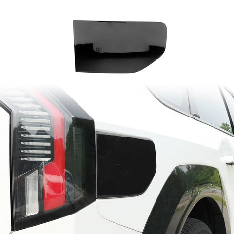 Fresh Glossy Black EV Charging Port Cover Trim Compatible With Kia EV9 2024 2025 2026 on white vehicle rear view.