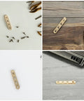 Eight Pack Copper Self Closing Pivot Door Hinges With Concealed Top And Bottom Design Heavy Duty And Secure on wood surface