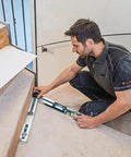 No Sweat Heavy Duty Digital Angle Finder Miter Calculator Protractor Level memory lock in use on staircase by builder.
