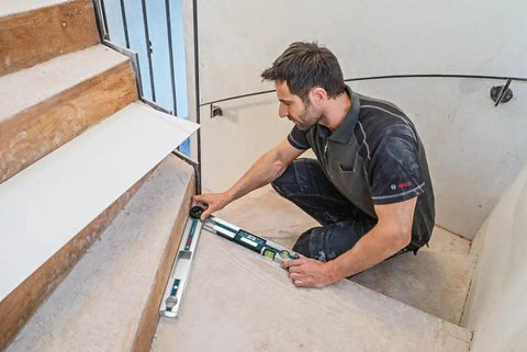 No Sweat Heavy Duty Digital Angle Finder Miter Calculator Protractor Level memory lock in use on staircase by builder.