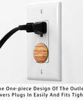 Slick Pine Wood Texture Child Proof Outlet Covers For Wall Sockets on white wall, showcasing one-piece design for easy snap installation.